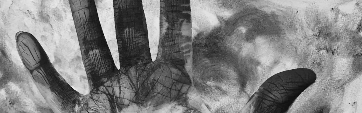 a charcoal covered hand
